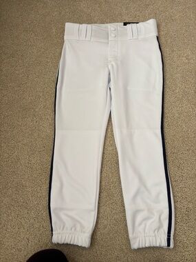 Girls medium softball pants white with navy blue piping on side. NWT. BP11 style